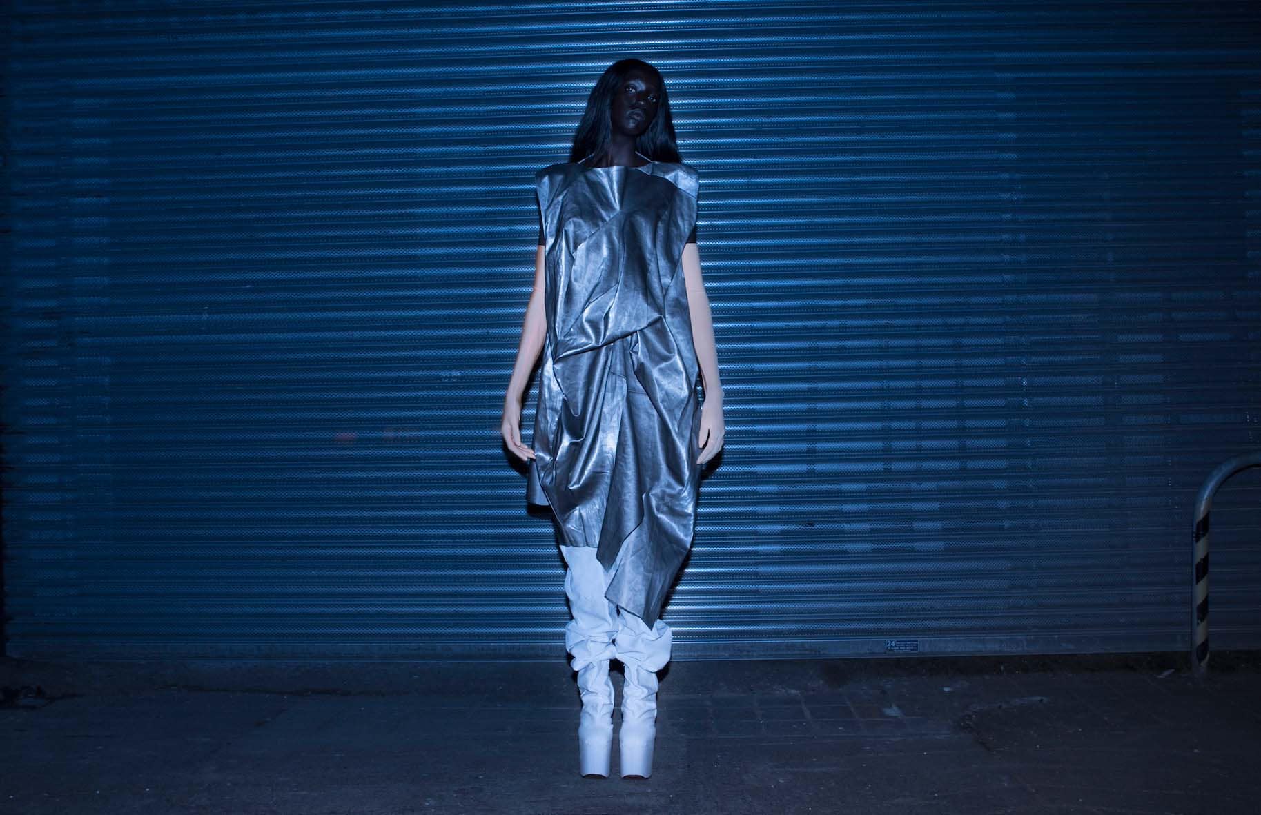 Black model wearing metallic silver dress by Micol Ragni AW17 collection